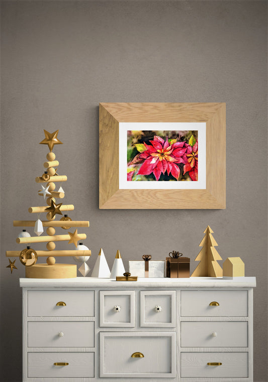 Golden poinsettias watercolor painting above Dresser